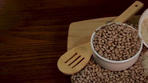 Grains of rice and beans, composition with rotation. Stock Footage 133898340