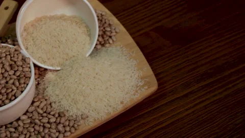 Grains of rice and beans, composition with rotation. Stock Footage 133898432