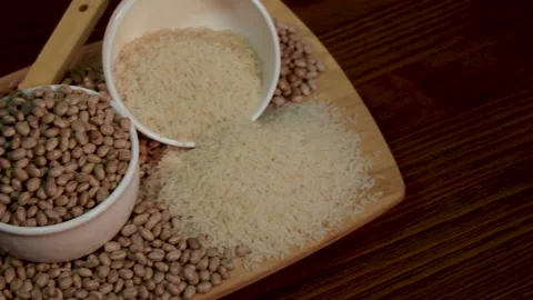 Grains of rice and beans, composition with rotation. Stock Footage 133898485