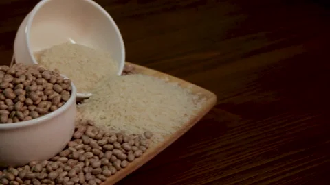 Grains of rice and beans, composition with rotation Stock Footage 133898587