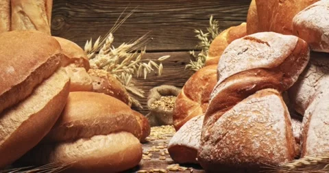 Grains in sack and mix of buns on wooden table 動画素材 242806518