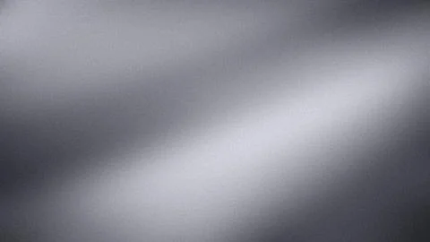 Grainy abstract gray gradient texture background wallpaper in 4K resolution.. Stock Photos
