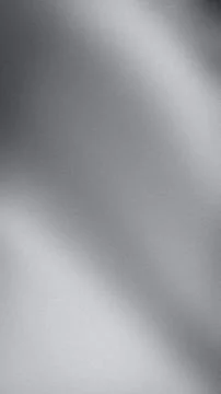 Grainy abstract gray silver black gradient background vertical format wallp.. Stock Photos