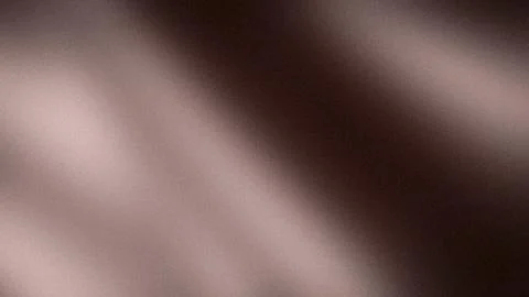 Grainy abstract soft brown beige and dark brown gradient background in 4K t.. Stock Photos