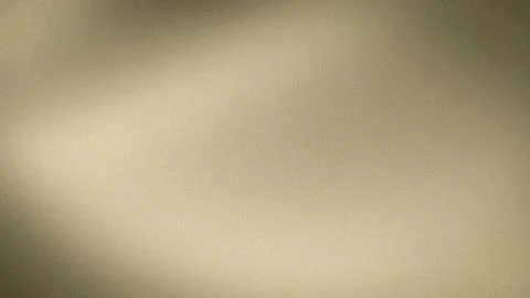 Grainy beige gradient abstract background with soft golden and taupe tones .. Stock Photos