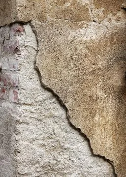 Grainy broken concrete wall background Stock-Fotos