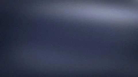 Grainy dark blue texture abstract background with subtle light gray gradien.. Stock Photos