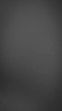 Grainy dark gray gradient background texture blur abstract grunge wallpaper.. Stock Photos