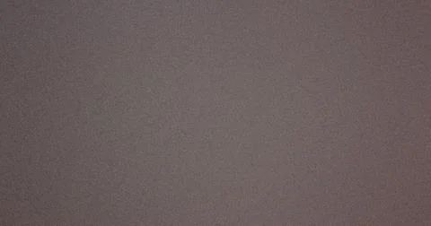 Grainy gradient background fading from light to dark gray Stock Photos