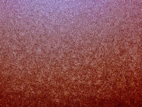 Grainy gradient texture blending azure hues into earthy maroon speckles evo.. Stock Photos