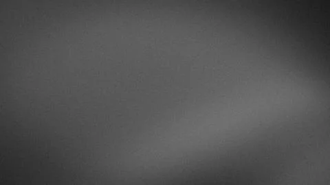 Grainy gray gradient background with black and white tones for 4K abstract .. Stock Photos