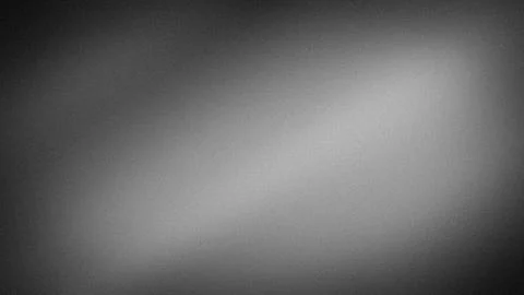 Grainy grayscale abstract background with gradient blur texture digital 4K .. Stock Photos