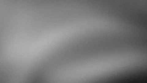 Grainy grayscale abstract background with gray black and white textures in .. Stock Photos