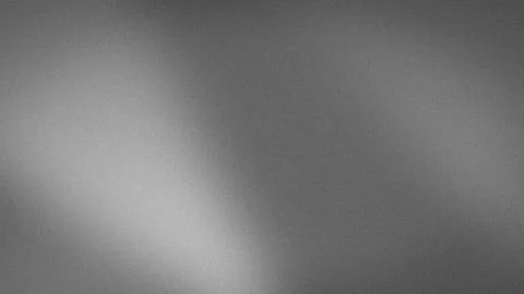 Grainy grey gradient texture background with blur effect ideal for tech wal.. Stock Photos