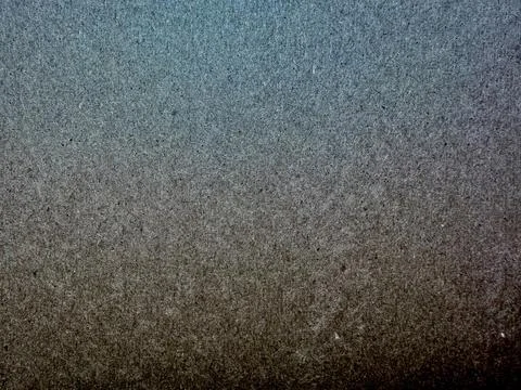 Grainy speckled blue gradient texture macro fading to brown moody abstract .. Stock Photos