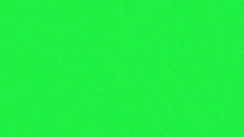 Grainy texture moving over a solid bright green background Stock Footage 331767816