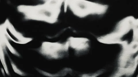 Grainy textured liquid morphs slowly in a surreal monochromatic abstract visual  Stock Footage 337025524