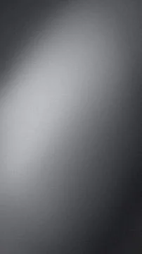 Grainy vertical gradient silver gray black background abstract texture blur.. Stock Photos
