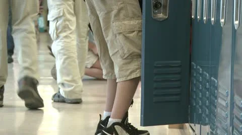 A grammar school student getting things out of locker (3 of 3) Stock-Footage 8978955