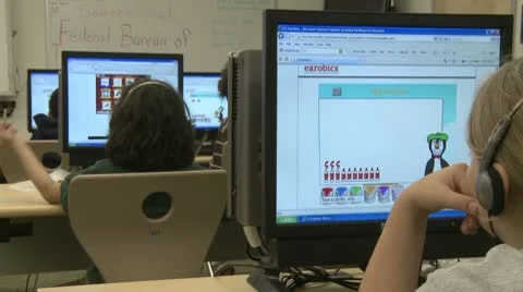 Grammar school students using computer in classroom (9 of 11) Stock Footage 8979030