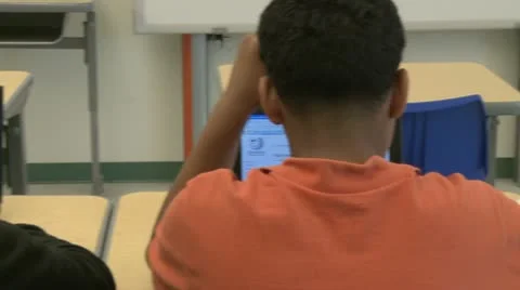 Grammar school students using computer in classroom (11 of 11) Stock Footage