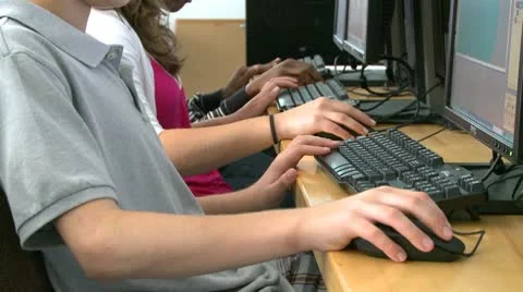 Grammar school students working on computer keyboard (3 of 3) Stock Footage 10356887