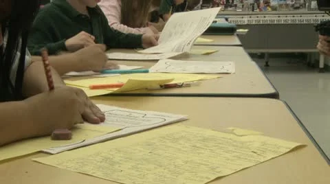 Grammar school students working on papers in classroom (8 of 11) Stock Footage 8978841