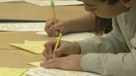 Grammar school students working on papers in classroom (11 of 11) Stock Footage 8978845