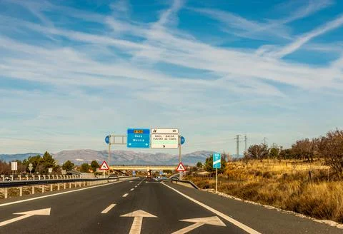 GRANADA SPAIN, DECEMBER 15, 2018 A fast road in the mountains to the city of  Stock Photos