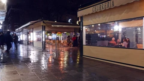 Granada, Spain - December 28, 2021: Outdoors covered restaurants in Granada Stock Footage 167772802