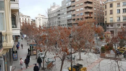 Granada, Spain - December 28, 2021: High perspective view of pedestrians on a Stock Footage 167775174
