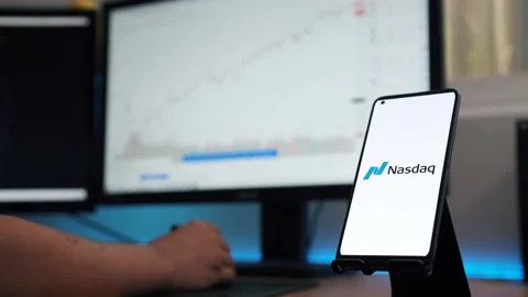 Granada, Spain; June 4, 2022: Nasdaq 100 logo on phone screen stock image wit Stock Footage 198345706