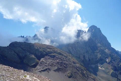 Grand alpine mountain range during summer on a hiking trail leading from Juta Stock Photos