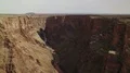 Grand Canyon Aerial Shot of Gorge and Rock Formation in Navojo Nation - Backward 4k or 4k+ Resolution