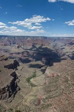Grand Canyon landscape featuring dramatic cliffs and vibrant rock formation.. Stock Photos