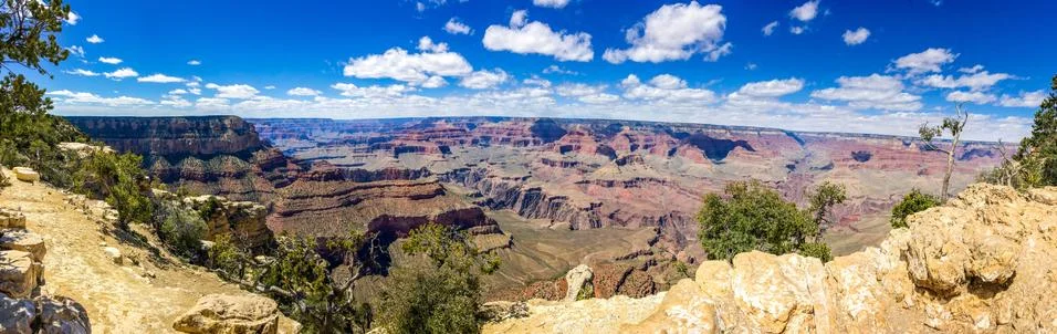 Grand Canyon panorama view in summer with blue sky. Stock Photos