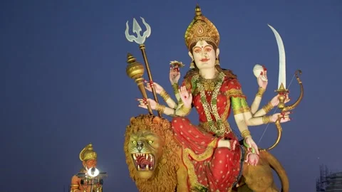 Grand Durga Idol with Lion Mount Displayed Against Evening Sky Background Stock Footage 337170392