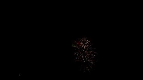 Grand firework display lighting up the dark night sky Stock Footage 329674165