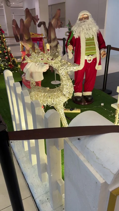 Grand Holiday Display Featuring Sparkling Reindeer and Jolly Santa Figures .. Video stock 325276100