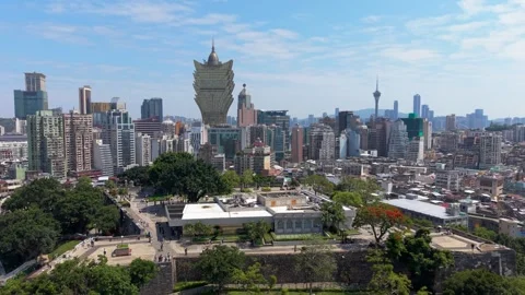 Grand Lisboa and Macau Tower Rise Behind Macau Museum at Mount Fortress Stock Footage 340183347