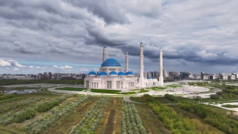 Grand mosque against a dramatic cloudy sky in astana Stock Footage 323859928