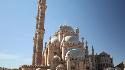Grand mosque architecture massive domes tall minaret Islamic design intricate st Stock Footage 310535683