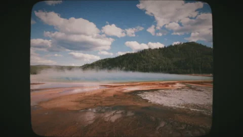 Grand Prismatic Spring - hot spring water surface covered with steam in Yello Stock Footage 136731583