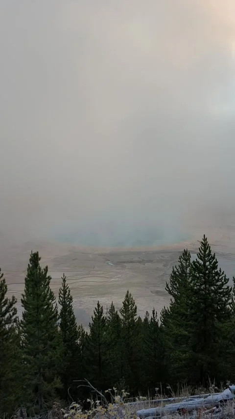 Grand Prismatic Spring steams on a cold morning in Yellowstone National Park Stock Footage 321505751