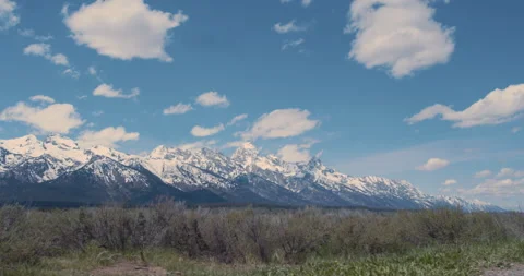 Grand Teton Range with Dramatic Sky and Sagebrush Foreground Video stock 347223932