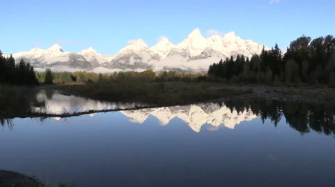 Grand Tetons in Fall Sunrise Reflection Vídeos de archivo 55600406