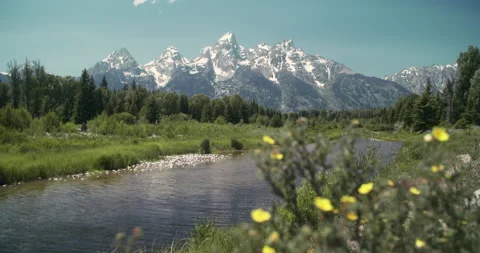Grand Tetons with river foreground Видео 228847309