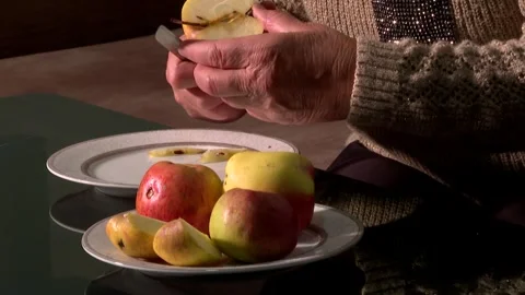 Grandma cut an apple 2 Stock-Footage 325600639