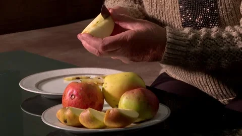 Grandma cut an apple 3 Video stock 325600642