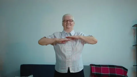 Grandma does exercises various twists Stock Footage 131368952